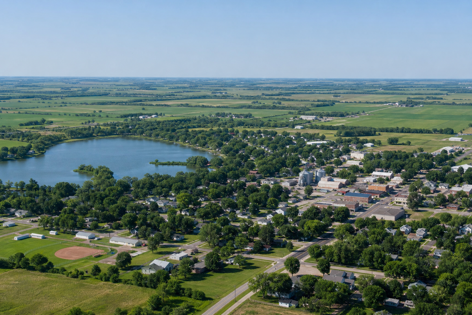 Elevated illustrative view of a small prairie town beside a lake in southwestern Minnesota