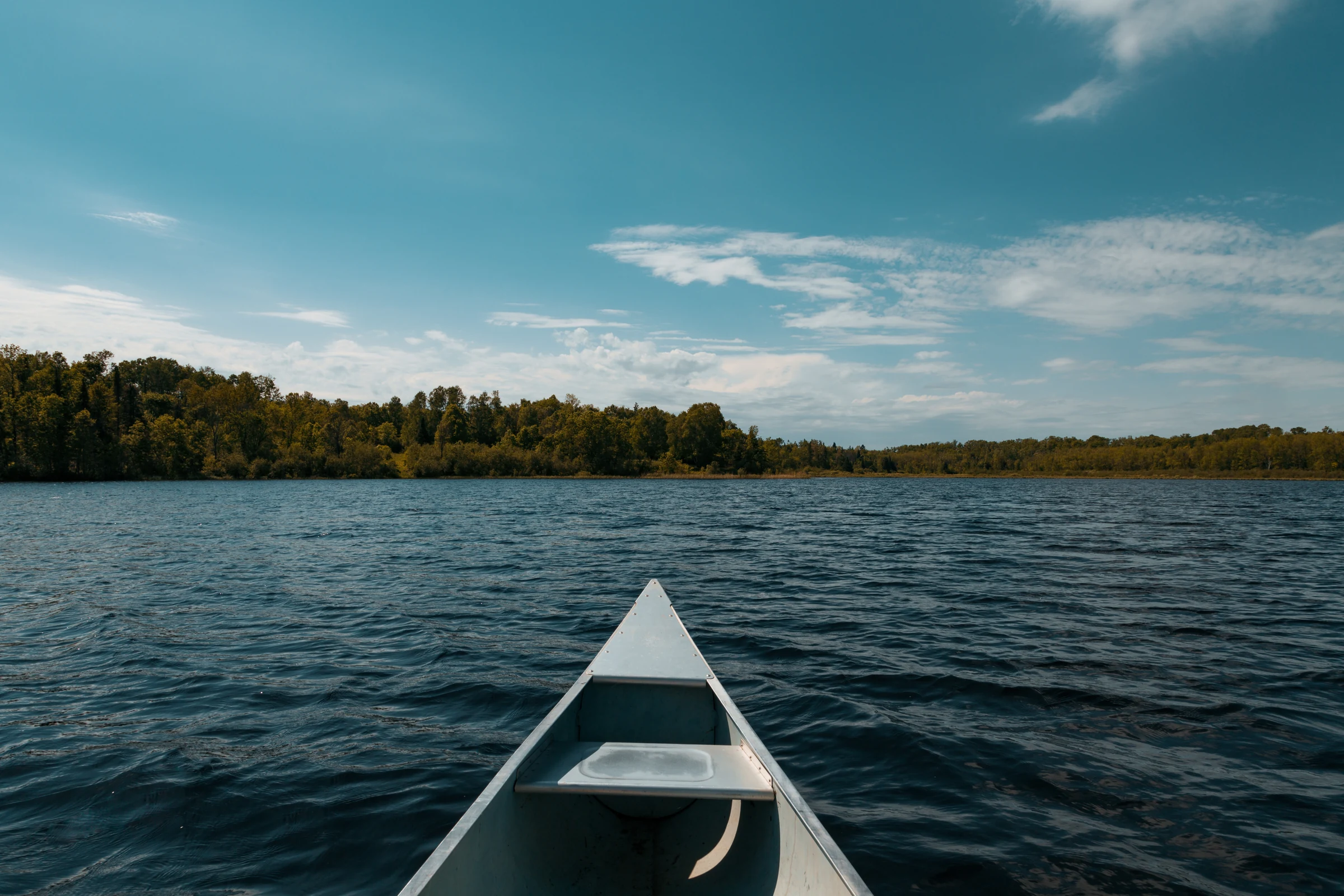 Bow of a canoe on Savanna Lake at Savanna Portage State Park, Minnesota.
