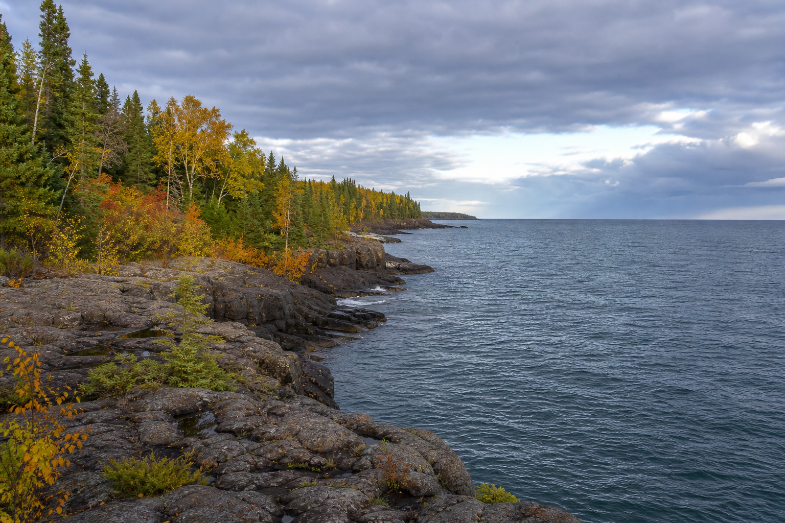 Illustrative autumn view along Northeast Minnesota’s rocky Lake Superior shore.